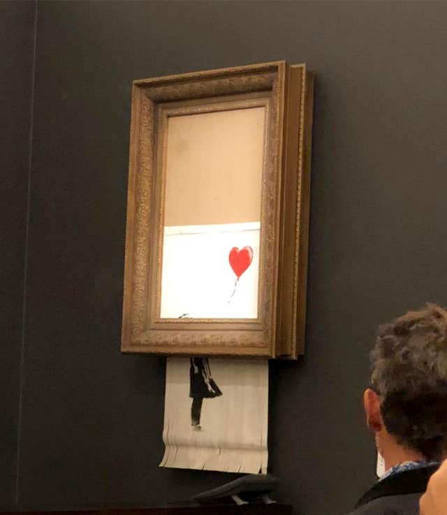 Banksy’s artwork, Girl With Balloon, which shredded itself after being sold for more than £1 million at auction