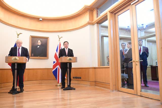 Mr Johnson spoke at the Chilean ministry of foreign affairs (Stefan Rousseau/PA)