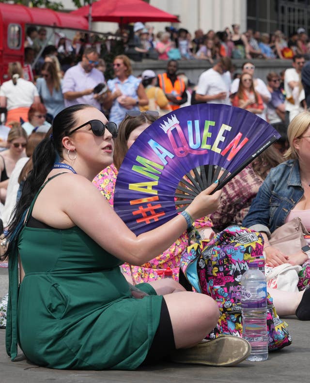 Woman using a fan