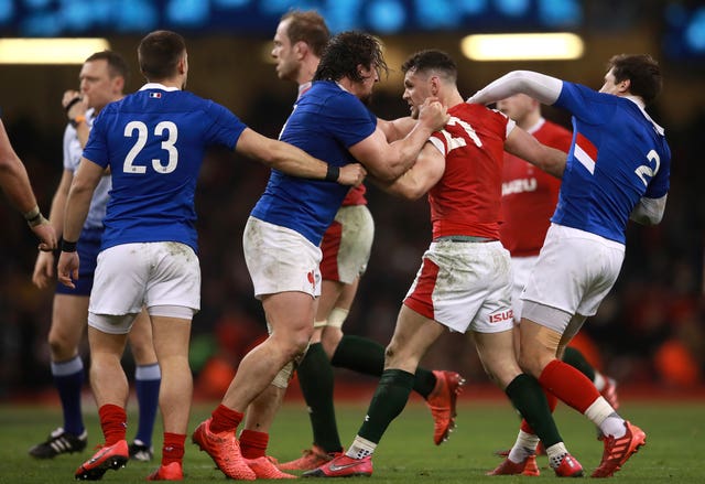 France unlined their title credentials, battling past Wales 27-23 in Cardiff 