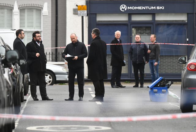 Police officers at stabbing scene