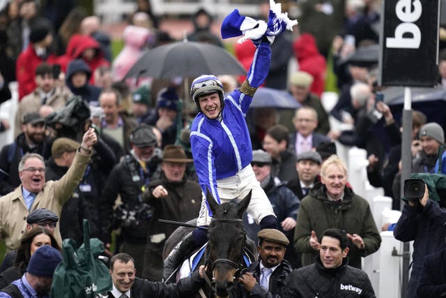 Paul Townend celebrates winning the Betway Queen Mother Champion Chase aboard Energumene (Andrew Matthews/PA)