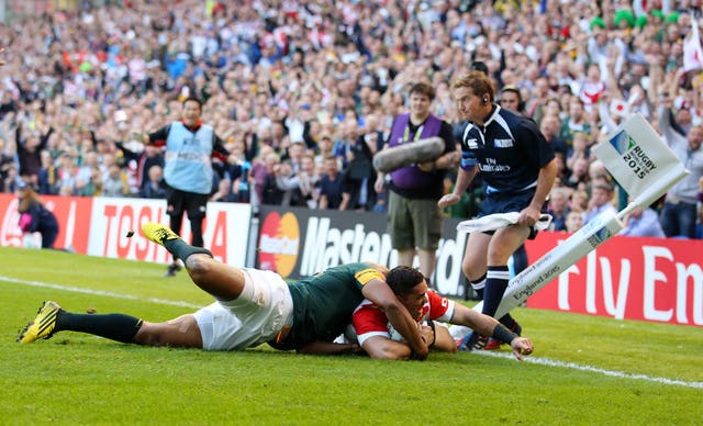 Japan’s Karne Hesketh scores the winning try against South Africa in 2015