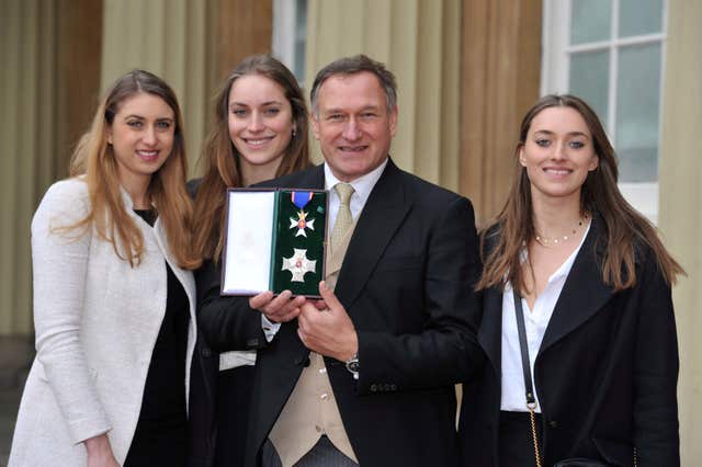 Adventurer Sir David Hempleman-Adams at Buckingham Palace in central London with his daughters (left to right) Alicia, Amelia and Camilla, after he was made a Knight Commander of the Royal Victorian Order by the Duke of Cambridge (Nick Ansell/PA)