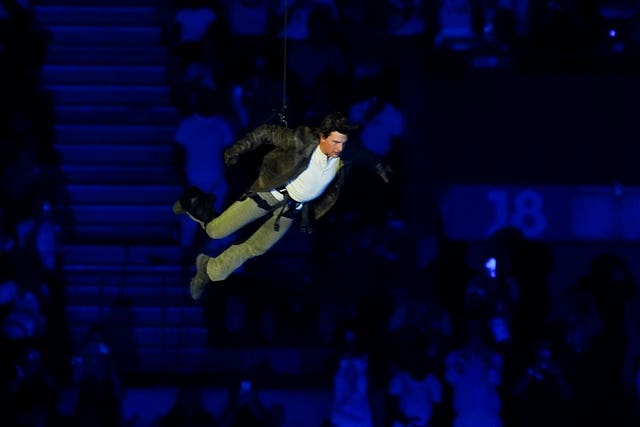 Tom Cruise jumps from the stadium roof during the closing ceremony of the 2024 Paris Olympic Games