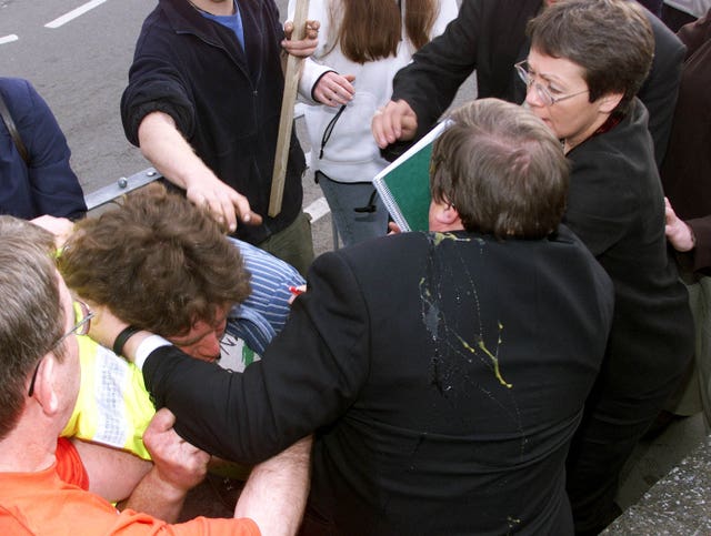 John Prescott being surrounded by protesters after he was hit by an egg