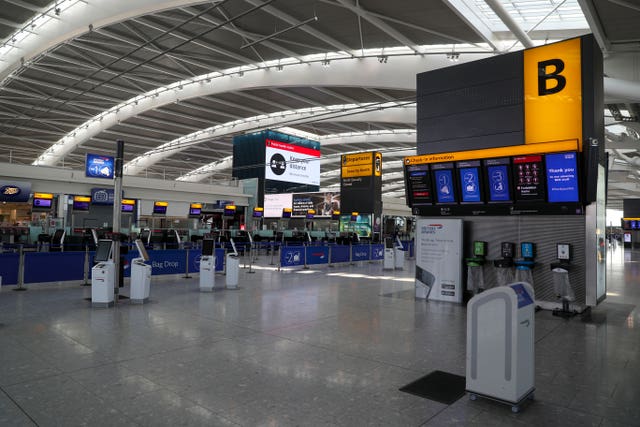 Empty check in desks at Heathrow Terminal 5 