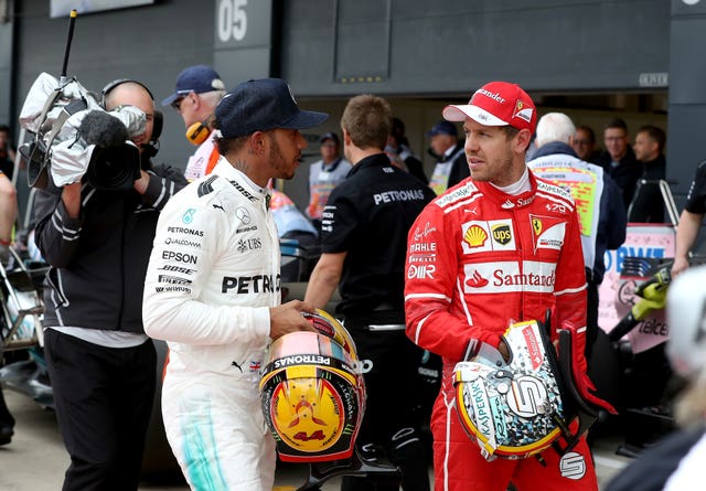 Ferrari’s Sebastian Vettel, right, has pushed Lewis Hamilton all the way so far this season