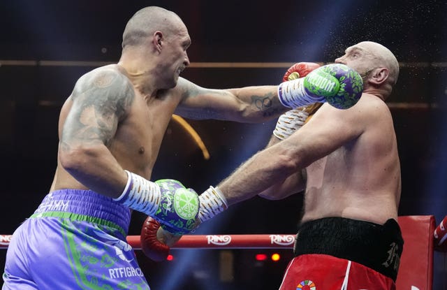 Tyson Fury and Oleksandr Usyk during the WBA, WBC, WBO, IBO World Heavyweight championship contest at the Kingdom Arena in Riyadh, Saudi Arabia. 