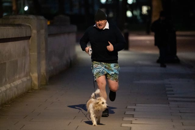 Prime Minister Boris Johnson jogging in central London (Aaron Chown/PA)