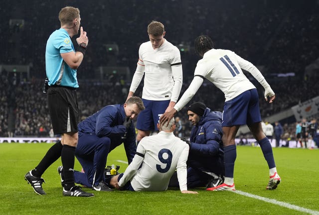 Richarlison is treated on the pitch for an injury 