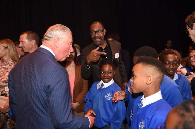 The Prince of Wales with Sir Lenny Henry during a visit to the Royal Albert