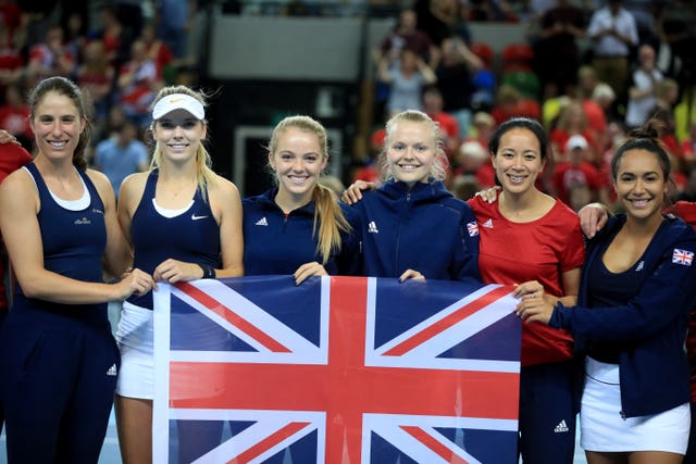 Anne Keothavong, second right, celebrates Fed Cup promotion with the Great Britain team