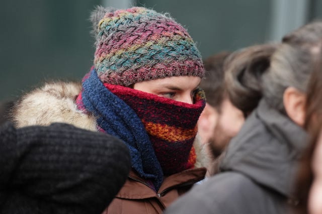 Dr Beth Upton, with only her eyes visible from a hat and scarf