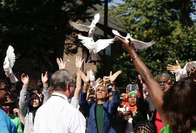 Mayor of London Sadiq Khan takes part in a release of doves as a show of respect for those who died in the Grenfell Tower fire in the 2017 celebrations (Yui Mok/PA)