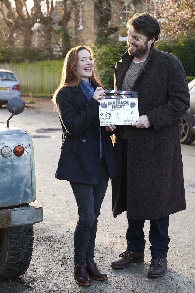 Tom Burke and Holliday Grainger on the set of the Strike- The Ink Black Hea