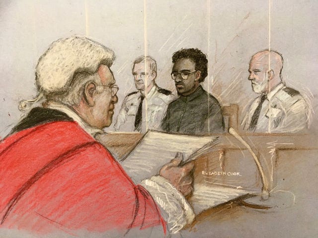 Mr Justice Sweeney (left) handing down a whole life sentence at the Old Bailey in London, to Ali Harbi Ali (second right) (Elizabeth Cook/PA)