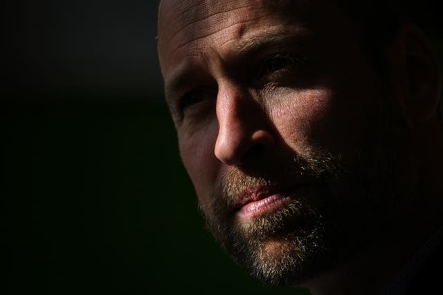 The Prince of Wales, in close up, with his face in shadow