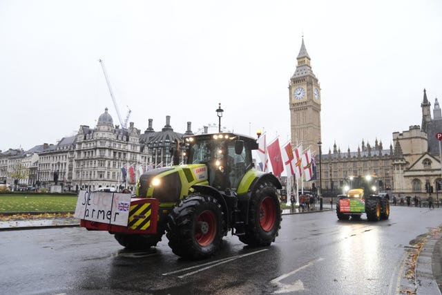 Farmers driving tractors in Parliament Square, London