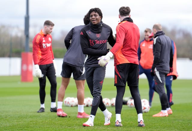 Manchester United’s Patrick Dorgu (centre) during a training session at Carrington