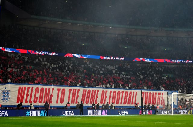 England fans holding up a banner for Thomas Tuchel