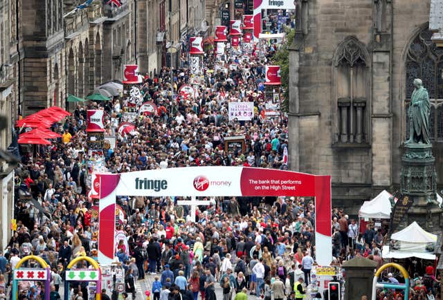 Crowd down Edinburgh's Royal Mile
