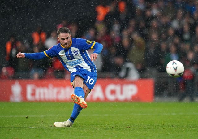 Brighton's Alexis Mac Allister takes a penalty