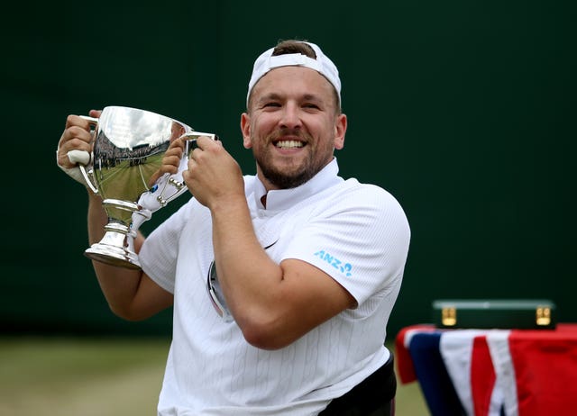Dylan Alcott celebrates victory in the men’s quads wheelchair singles on day twelve of the Wimbledon Championships at the All England Lawn Tennis and Croquet Club, Wimbledon