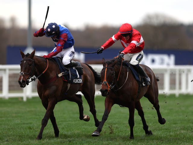 Crambo ridden by Jonathan Burke, right, won the Long Walk Hurdle at Ascot and denied three-time winner Paisley Park a record-equalling fourth success 