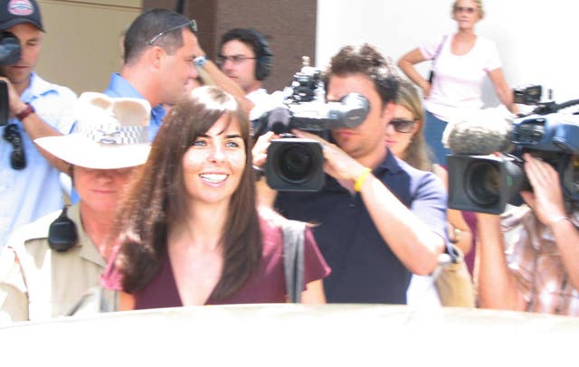 British backpacker Peter Falconio’s girlfriend Joanne Lees smiles as she leaves Northern Territory Supreme Court in Darwin