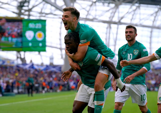 Michael Obafemi (left) celebrates after scoring the Republic of Ireland’s third goal against Scotland in June