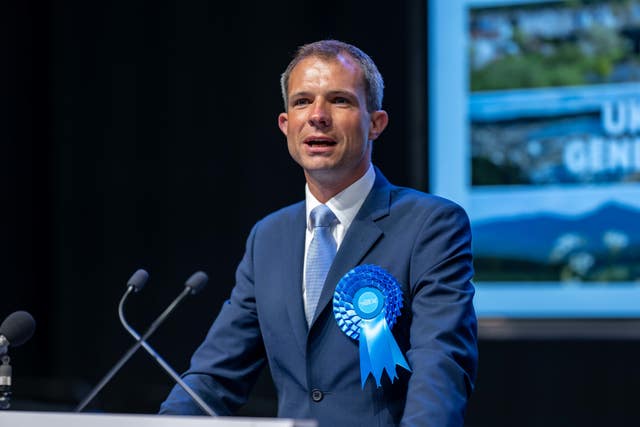 Andrew Bowie gives a speech after his general election victory