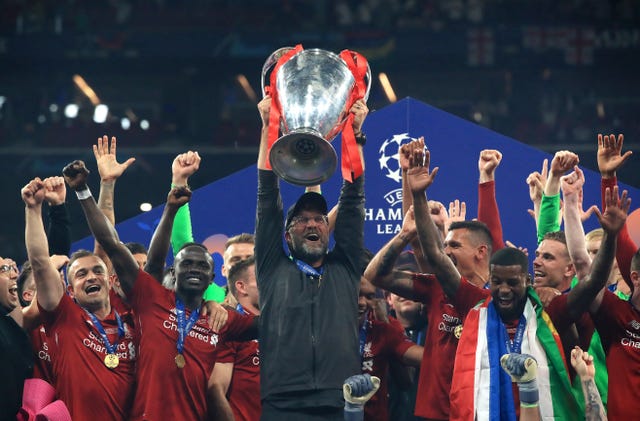 Jurgen Klopp lifts the Champions League trophy