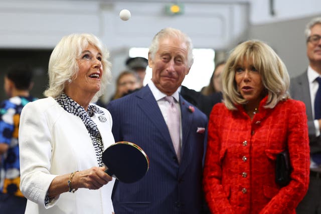 The Queen plays table tennis