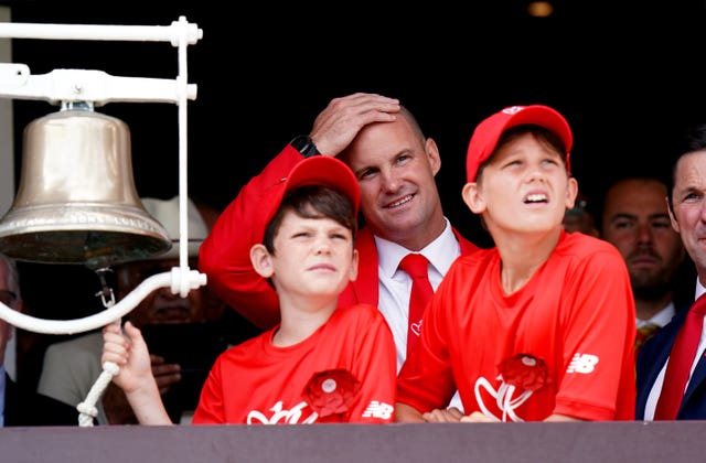 Sir Andrew Strauss (second right) with sons Luca and Sam before ringing the five-minutes-to-play bell at Lord’s last summer