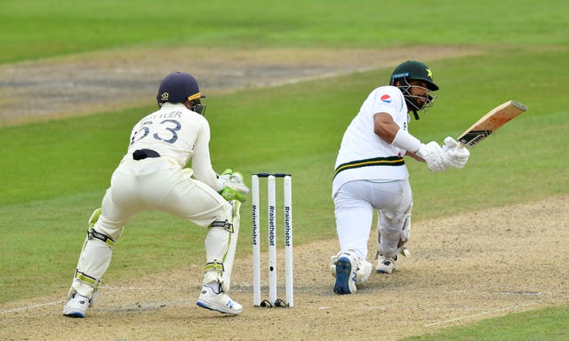 Shan Masood hits the ball for four on day two