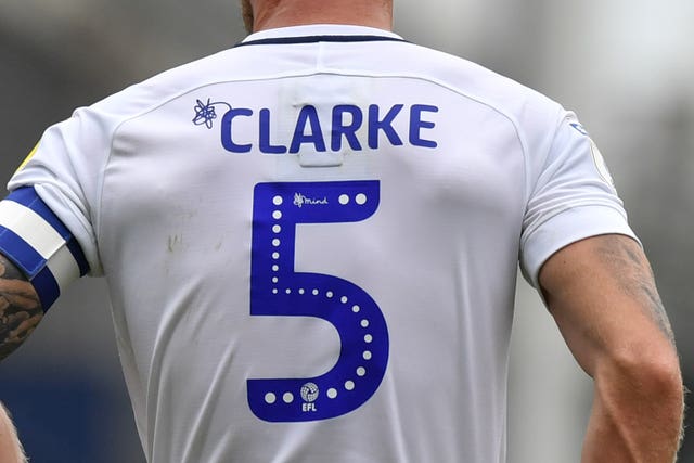 The Mind logo on Preston captain Tom Clarke's shirt
