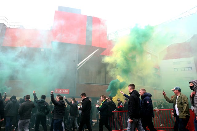 Fans make their way into the ground as they protest against the Glazer family on May 2