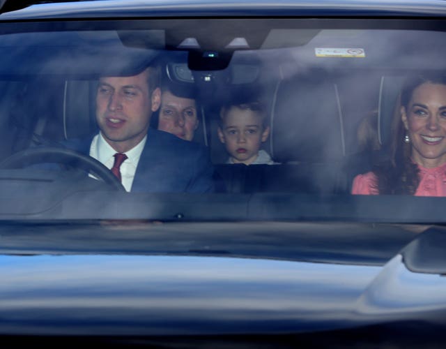 William, Kate, George, a partially obscured Charlotte, and the couple's nanny arriving for lunch. Aaron Chown/PA Wire