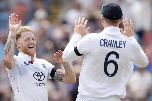 England’s Ben Stokes celebrates with Zak Crawley after taking the wicket of India’s Sai Sudharsan on day one
