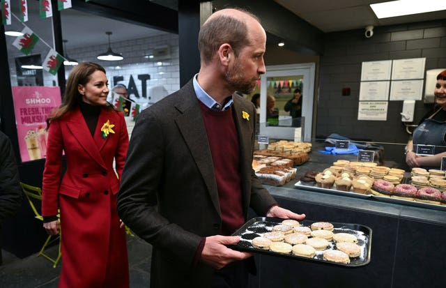 William holds a tray of Welsh cakes