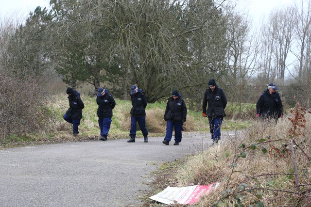 Officers from the Metropolitan Police conduct a search at Great Chart Golf and Leisure near Ashford, Kent 