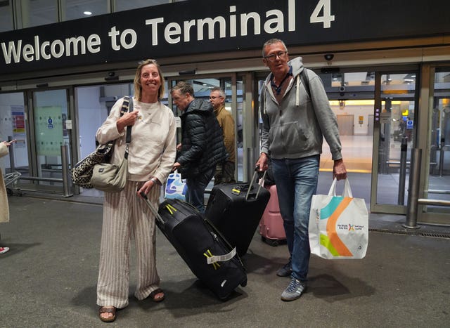 Two people with luggage 