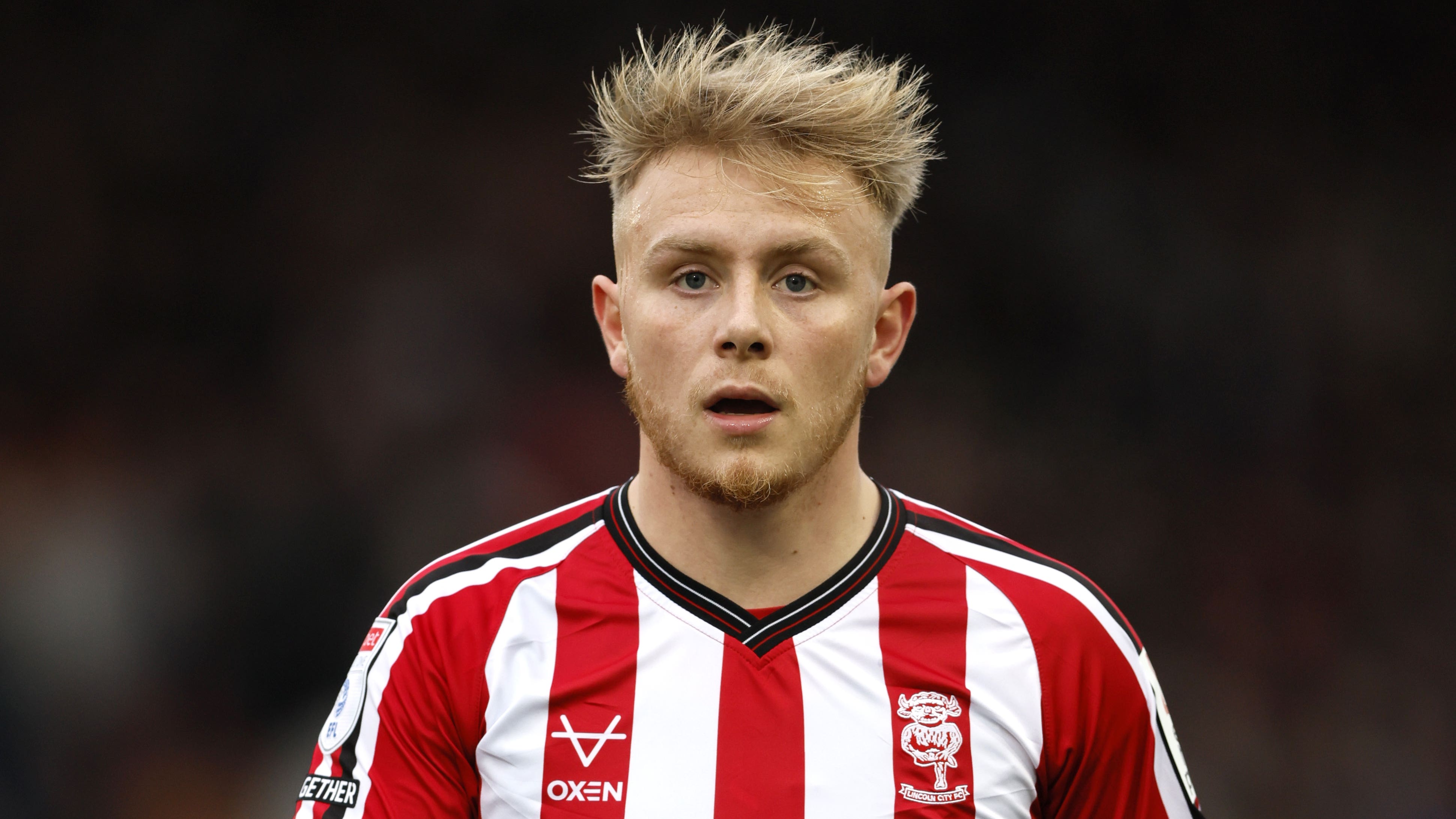 Joe Taylor opened the scoring in Lincoln’s demolition of Barnsley (Richard Sellers/PA)