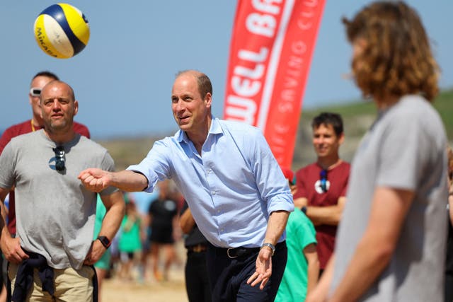 William takes a shot while playing volleyball during a visit to Fistrall Beach in Newquay