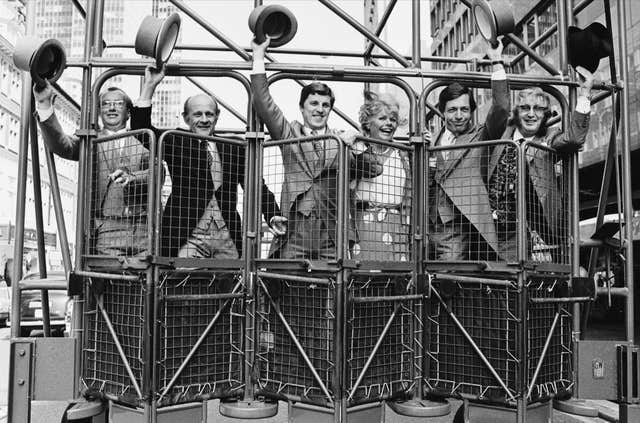 Judith Chalmers and colleagues in racing stalls
