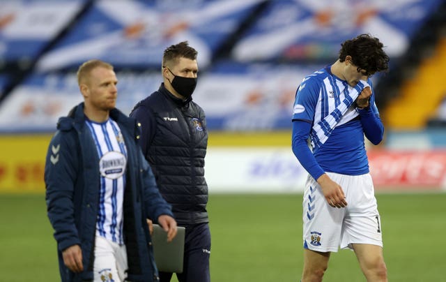 Kilmarnock's Chris Burke and Zeno Rossi trudge off after losing their Premiership place to Dundee