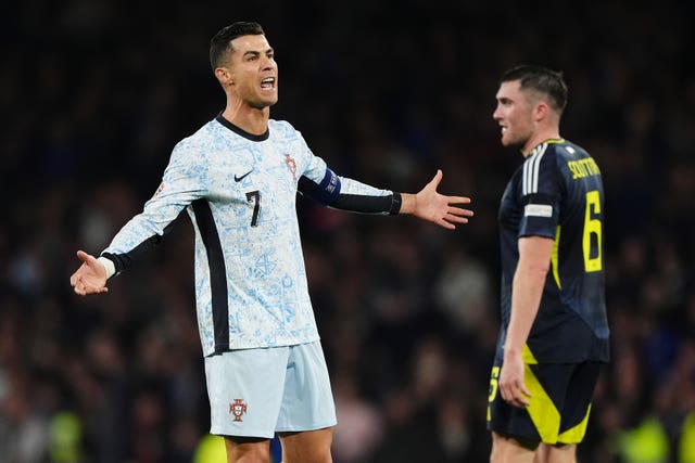 Portugal skipper Cristiano Ronaldo holds his arms out in frustration against Scotland