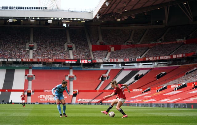 Ella Toone (right) in action for Manchester United Women