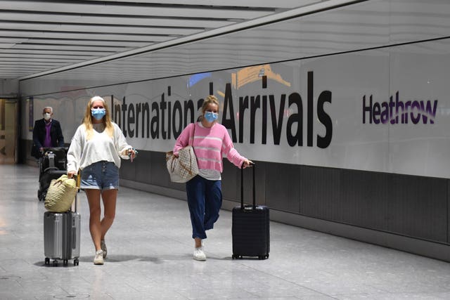 Passengers arrive at Heathrow Airport after a flight from Dubrovnik (Kirsty O'Connor/PA)